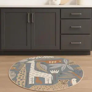 Photo of 4' Ivory Blue And Brown Animal Print Round Rug