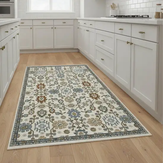 8' Ivory Blue And Brown Floral Runner Rug With Fringe Photo 1