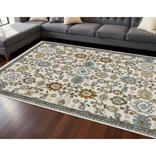 8' Ivory Blue And Brown Floral Runner Rug With Fringe Photo 2