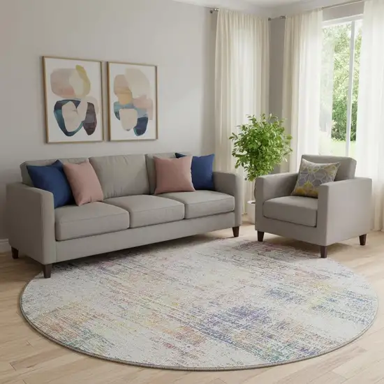 8' Ivory Blue And Gold Abstract Washable Round Rug With UV Protection Photo 1