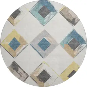 Photo of 8' Ivory Blue And Gold Geometric Washable Round Rug With UV Protection