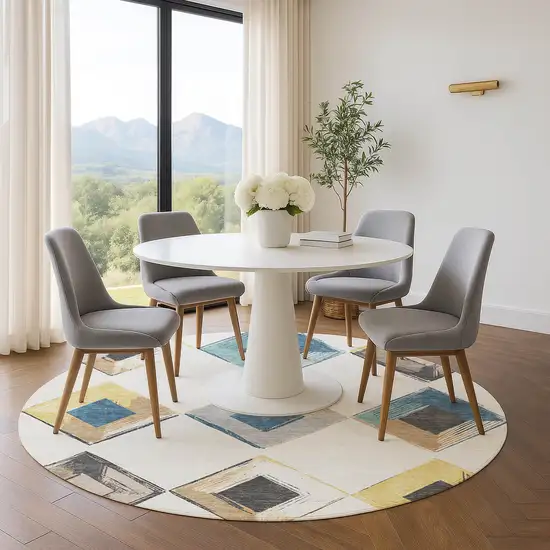 8' Ivory Blue And Gold Geometric Washable Round Rug With UV Protection Photo 4