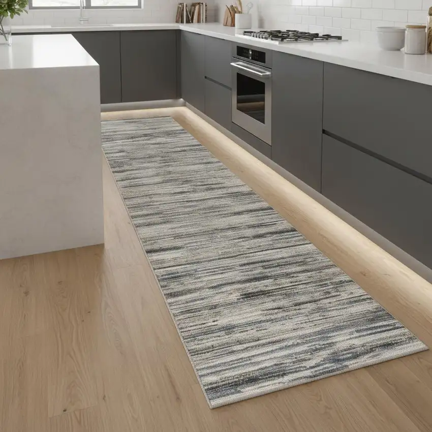 8' Ivory Blue And Gray Abstract Distressed Runner Rug Photo 1