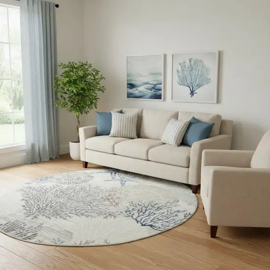 8' Ivory Blue And Gray Seashell and Coral Non Skid Round Rug Photo 1