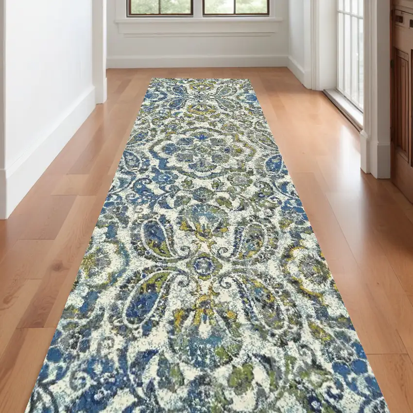 10' Ivory Blue And Green Floral Stain Resistant Runner Rug Photo 1