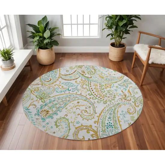 8' Ivory Blue And Green Paisley Washable Round Rug With UV Protection Photo 2