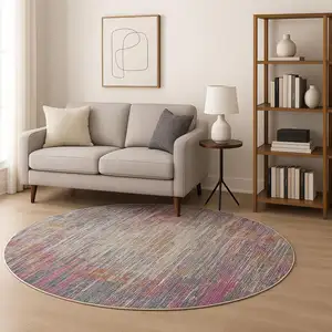 Photo of 10' Ivory Blue And Yellow Abstract Round Rug