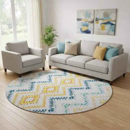 8' Ivory Blue And Yellow Geometric Washable Round Rug With UV Protection Photo 1