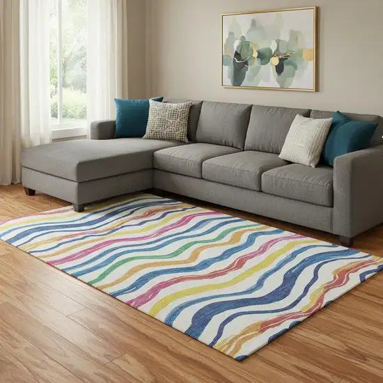 8' Ivory Blue Yellow And Pink Striped Washable Area Rug With UV Protection Photo 2