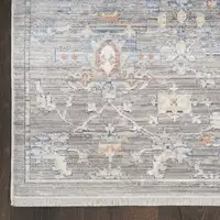 Photo of 12' Ivory Blue and Gray Oriental Power Loom Distressed Runner Rug