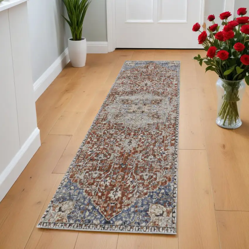8' Ivory Blue and Orange Oriental Power Loom Runner Rug With Fringe Photo 1