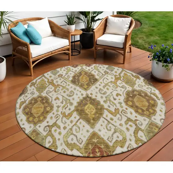 8' Ivory Brown And Gold Round Ikat Washable Indoor Outdoor Area Rug Photo 1