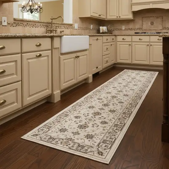 8' Ivory Brown And Gray Floral Runner Rug Photo 1