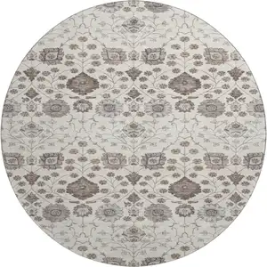 Photo of 8' Ivory Brown And Gray Floral Washable Round Rug With UV Protection