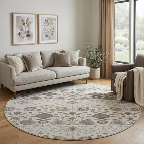 8' Ivory Brown And Gray Floral Washable Round Rug With UV Protection Photo 1