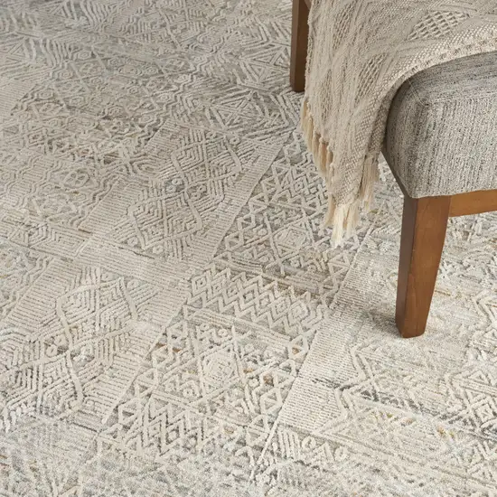 8' Ivory Brown And Gray Geometric Distressed Round Rug With Fringe Photo 6