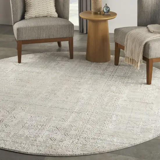 8' Ivory Brown And Gray Geometric Distressed Round Rug With Fringe Photo 5