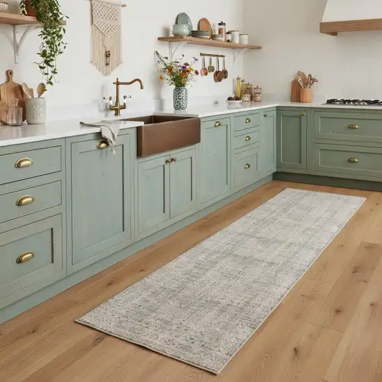 8' Ivory Brown And Gray Geometric Distressed Runner Rug With Fringe Photo 1