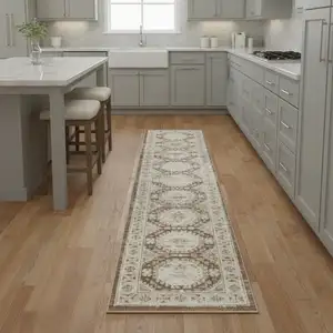 Photo of 8' Ivory Brown And Gray Geometric Distressed Runner Rug