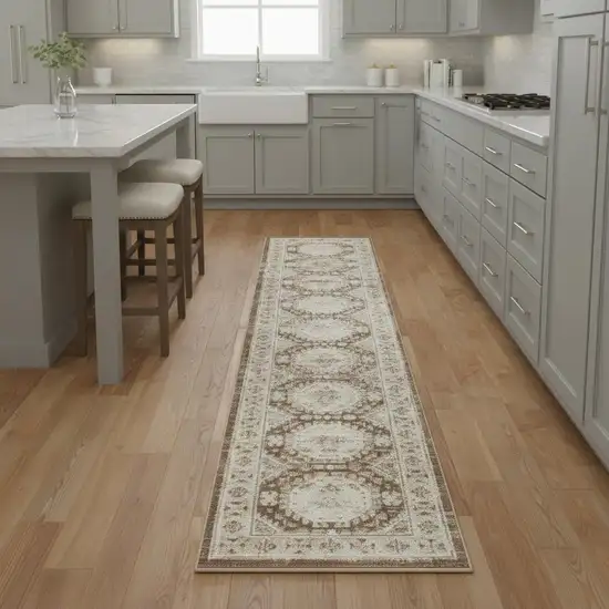 8' Ivory Brown And Gray Geometric Distressed Runner Rug Photo 1