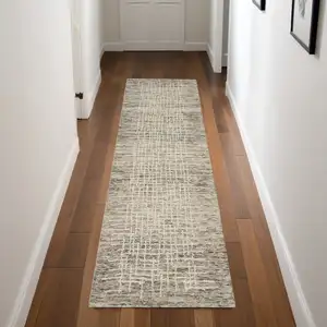 Photo of 8' Ivory Brown and Gray Wool Abstract Runner Rug