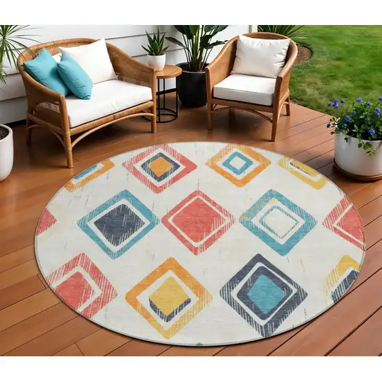 8' Ivory Coral And Teal Blue Round Geometric Washable Indoor Outdoor Area Rug Photo 2