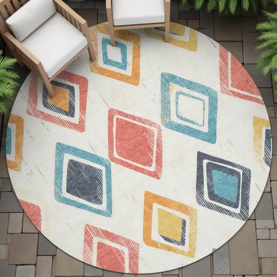 8' Ivory Coral And Teal Blue Round Geometric Washable Indoor Outdoor Area Rug Photo 7