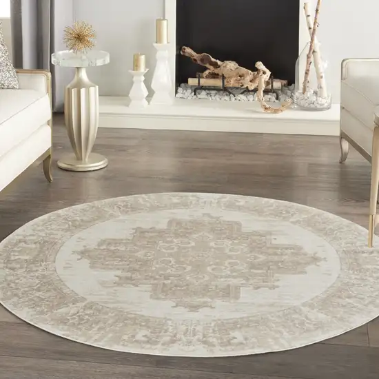 8' Ivory Floral Power Loom Round Rug Photo 5