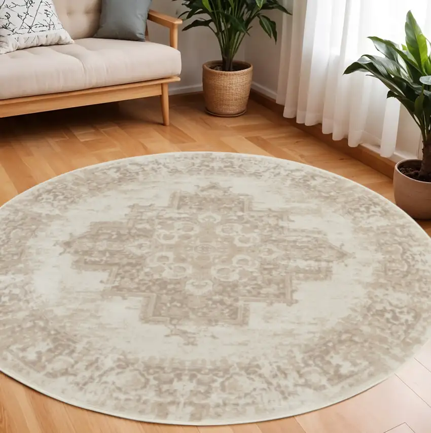 8' Ivory Floral Power Loom Round Rug Photo 1