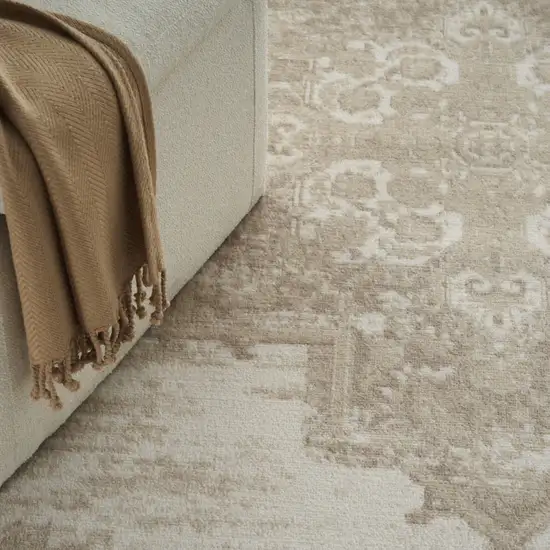 4' Ivory Floral Power Loom Worn Faded Round Rug Photo 8