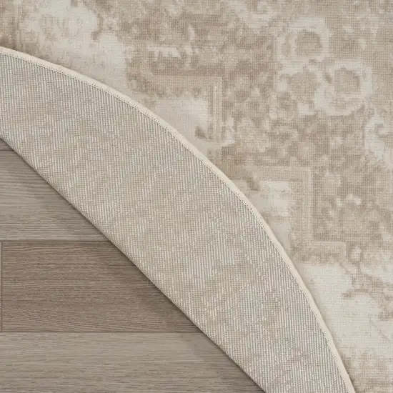 4' Ivory Floral Power Loom Worn Faded Round Rug Photo 8