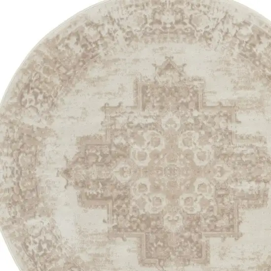 5' Ivory Floral Power Loom Worn Faded Round Rug Photo 3
