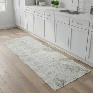 Photo of 8' Ivory Floral Power Loom Worn Faded Runner Rug