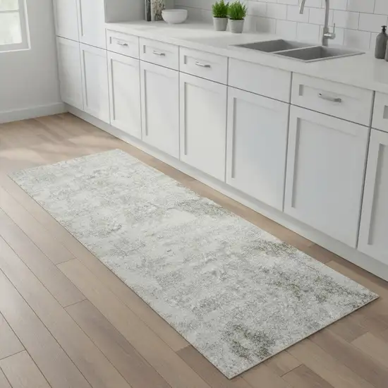 8' Ivory Floral Power Loom Worn Faded Runner Rug Photo 1