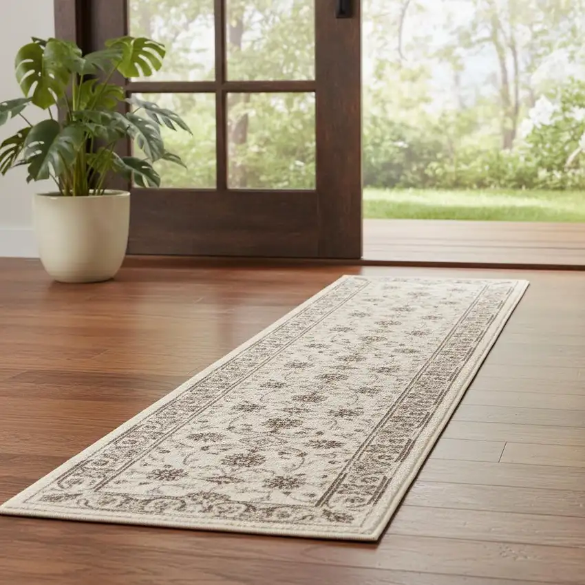 6' Ivory Floral Worn Faded Runner Rug Photo 1