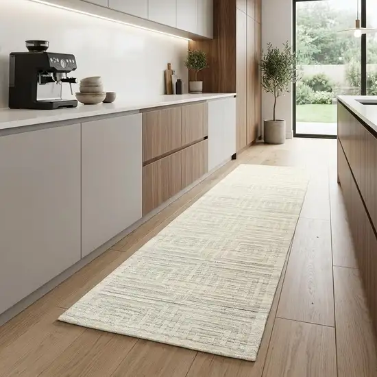 8' Ivory Geometric Hand Woven Runner Rug Photo 1