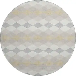 Photo of 8' Ivory Gold And Beige Geometric Washable Round Rug With UV Protection