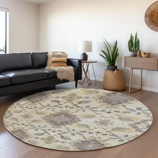 8' Ivory Gold And Beige Oriental Washable Round Rug With UV Protection Photo 4