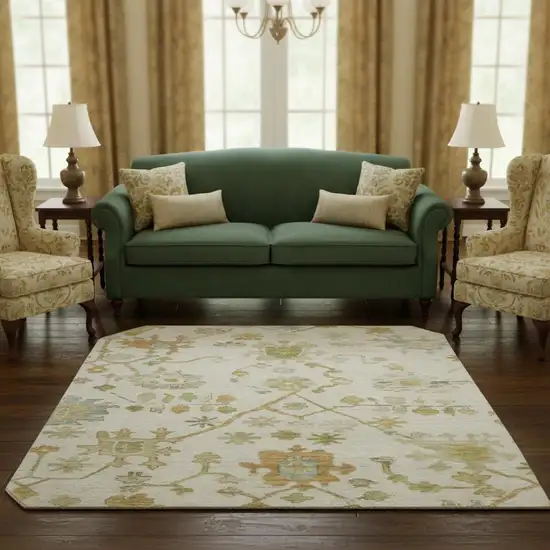 8' Ivory Gold And Blue Floral Washable Round Rug With UV Protection Photo 2