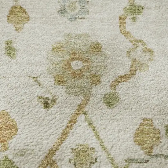 8' Ivory Gold And Blue Floral Washable Round Rug With UV Protection Photo 9