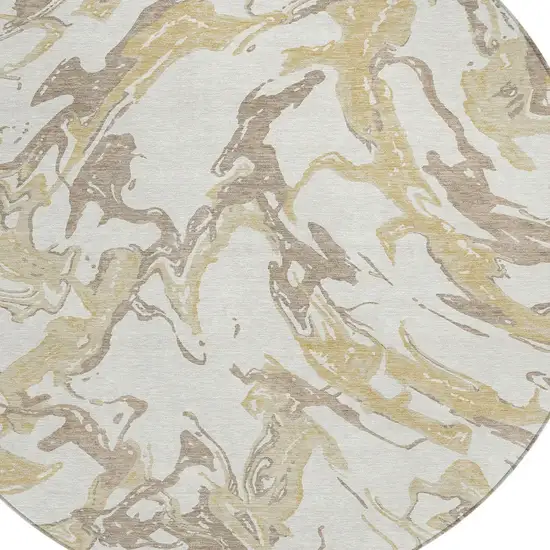 8' Ivory Gold And Brown Round Abstract Washable Indoor Outdoor Area Rug Photo 4