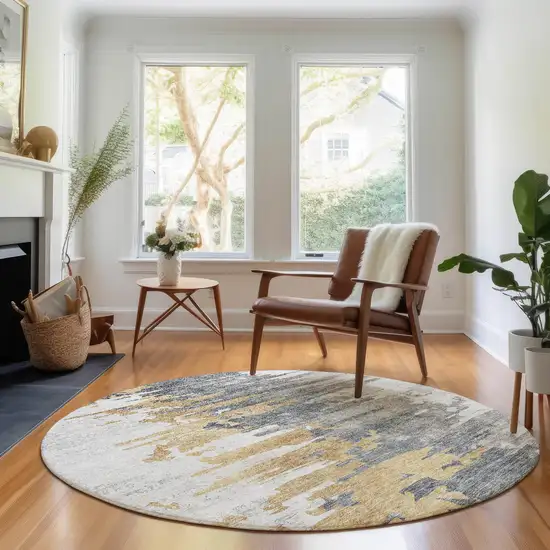 8' Ivory Gold And Gray Abstract Washable Round Rug With UV Protection Photo 5