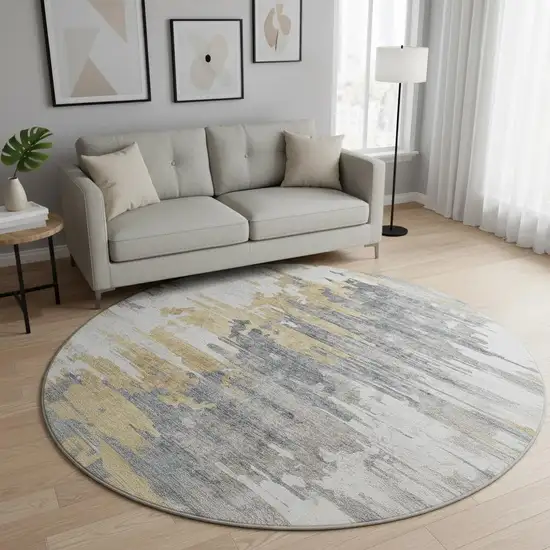 8' Ivory Gold And Gray Abstract Washable Round Rug With UV Protection Photo 2