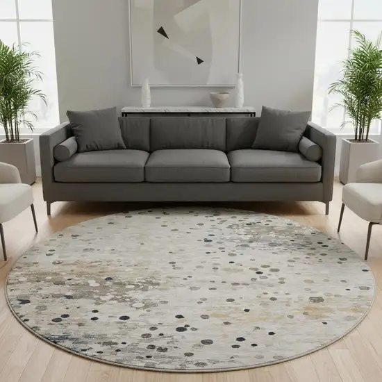 8' Ivory Gold And Gray Abstract Washable Round Rug With UV Protection Photo 2