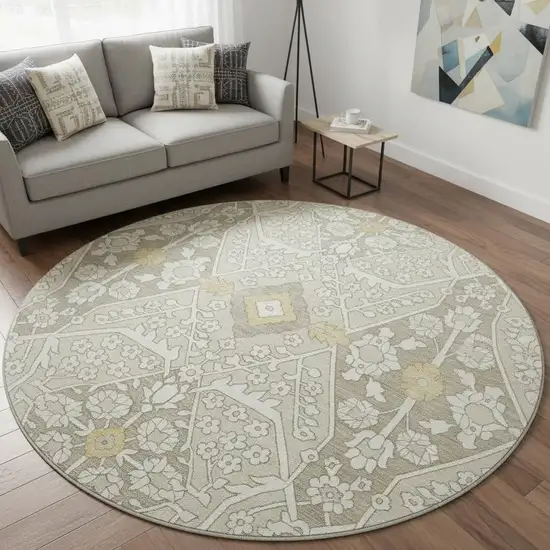 8' Ivory Gold And Gray Floral Washable Round Rug With UV Protection Photo 1