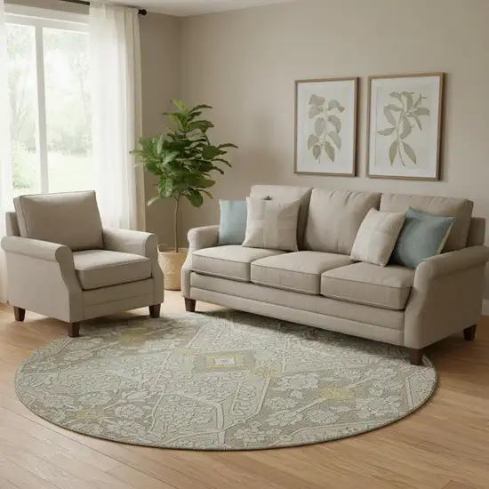 8' Ivory Gold And Gray Floral Washable Round Rug With UV Protection Photo 1