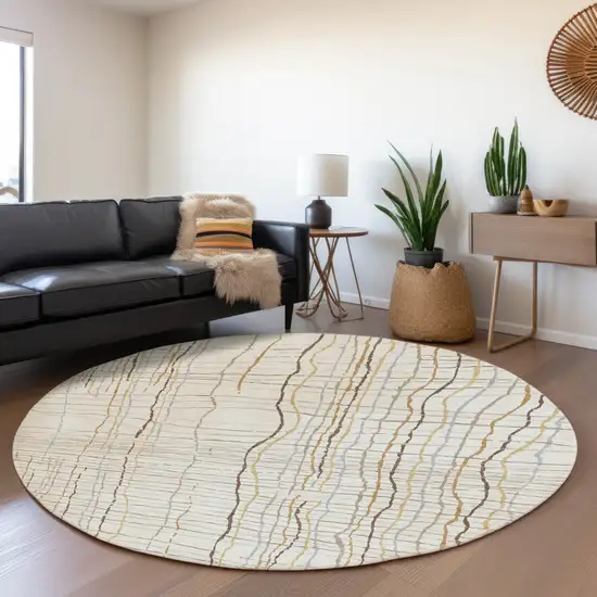 8' Ivory Gold And Gray Striped Washable Round Rug With UV Protection Photo 4
