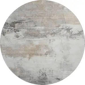 Photo of 8' Ivory Gray And Beige Abstract Washable Round Rug With UV Protection