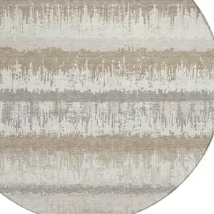Photo of 8' Ivory Gray And Beige Round Striped Washable Indoor Outdoor Area Rug