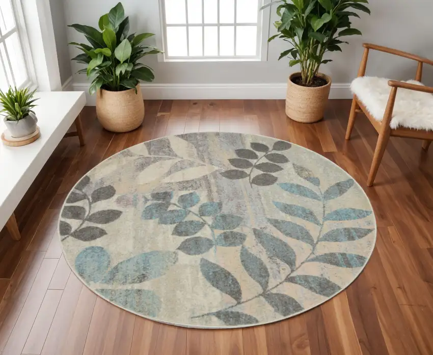 8' Ivory Gray And Blue Botanical Leaves Round Rug Photo 1